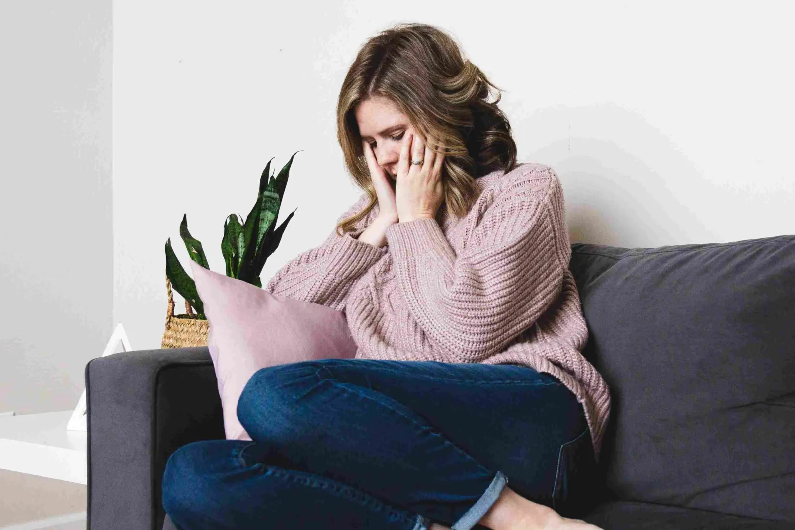 Person reflecting on the emotional impact of infertility