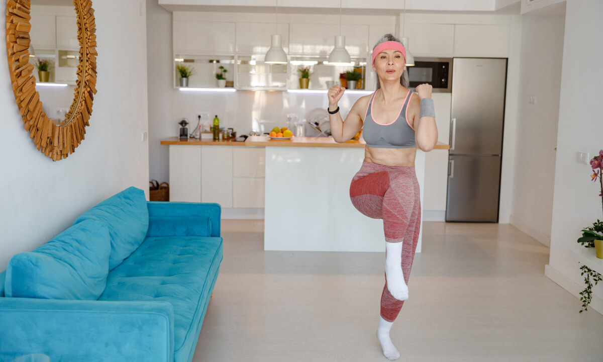 sporty woman doing exercise in living room 2024 10 18 08 06 49 utc 1