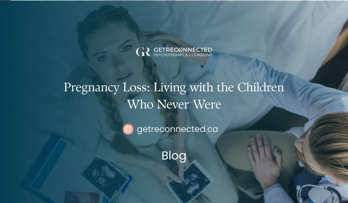 Woman Lying in Bed Holding an Ultrasound Photo, Symbolizing Grief and Reflection After Pregnancy Loss, Get Reconnected Psychotherapy Blog