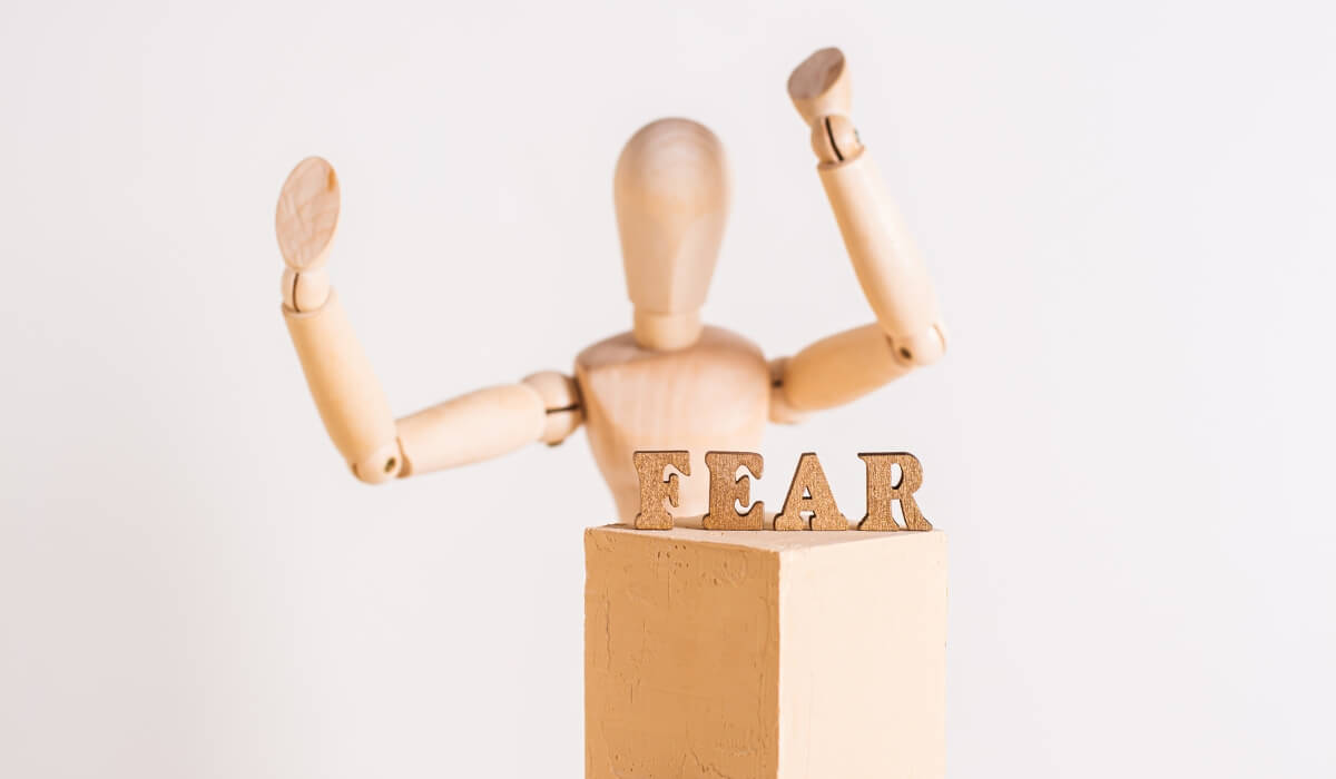 fear word wooden background