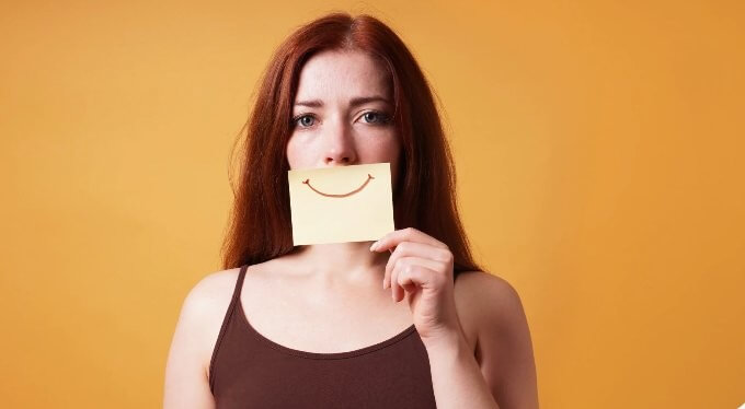 woman-suppressing-emotions